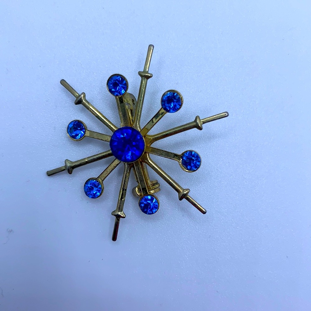 Vintage gold and blue starburst pin